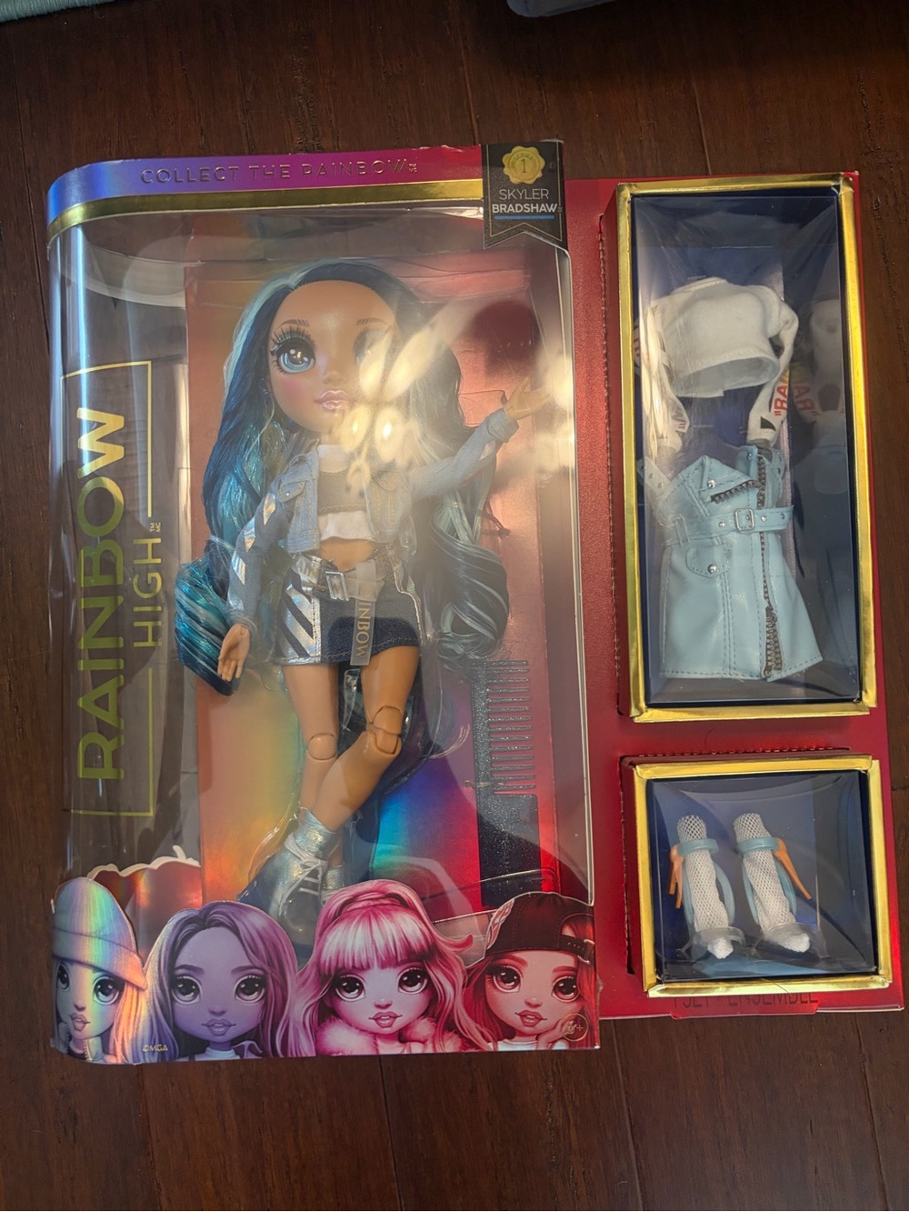 Rainbow Skyler Bradshaw Doll with Blue Hair and Metallic Outfit